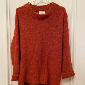 Cozy orange sweater.